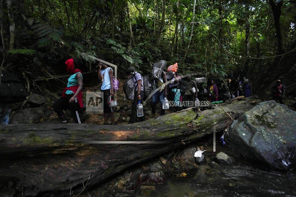 Fernando Vergara Migrants continue on their trek north, near Acandi, Colombia, Wednesday, Sept. 15, 2021. The migrants, mostly Haitians, are on their way to crossing the Darien Gap from Colombia into Panama dreaming of reaching the U.S. (AP Photo/Fernando Vergara)
