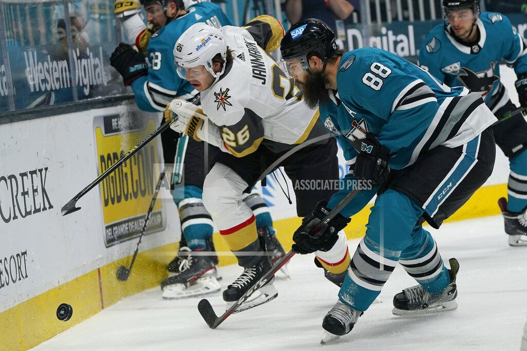Jeff Chiu Vegas Golden Knights center Mattias Janmark (26) and San Jose Sharks defenseman Brent Burns (88) skate toward the puck during the second period of an NHL hockey game in San Jose, Calif., Wednesday, May 12, 2021. (AP Photo/Jeff Chiu)