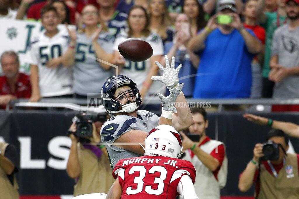 Rick Scuteri Seattle Seahawks tight end Will Dissly pulls in a touchdown pass as Arizona Cardinals cornerback Byron Murphy (33) defends during the first half of an NFL football game, Sunday, Sept. 29, 2019, in Glendale, Ariz. (AP Photo/Rick Scuteri)