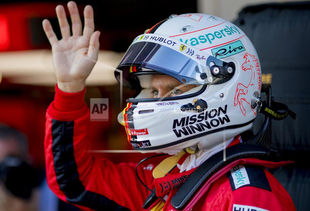 Joan Monfort Scuderia Ferrari Mission Winnow's Sebastian Vettel waves during the Formula One pre-season testing session at the Barcelona Catalunya racetrack in Montmelo, outside Barcelona, Spain, Friday, Feb. 21, 2020. (AP Photo/Joan Monfort)