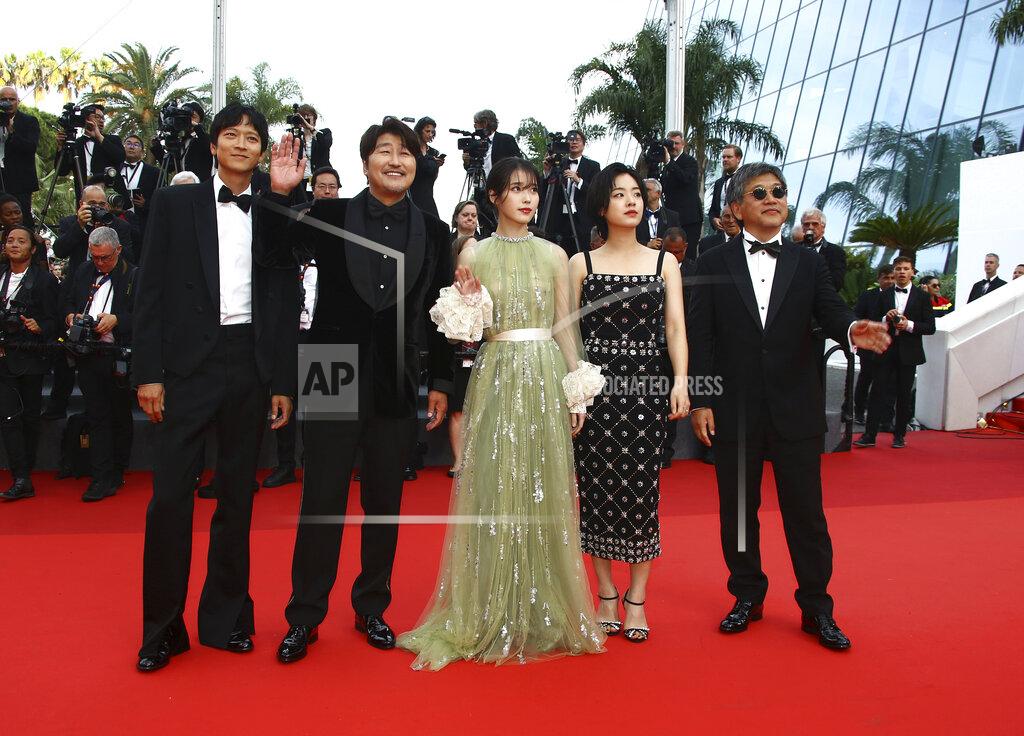 Joel C Ryan Dong-won Gang, from left, Song Kang-ho, Ji-eun Lee, Joo-Young Lee, and Director Hirokazu Koreeda pose for photographers upon arrival at the awards ceremony of the 75th international film festival, Cannes, southern France, Saturday, May 28, 2022. (Photo by Joel C Ryan/Invision/AP)