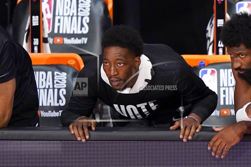 Mark J. Terrill Miami Heat's Bam Adebayo, watches play against the Los Angeles Lakers during the first half of Game 2 of basketball's NBA Finals, Friday, Oct. 2, 2020, in Lake Buena Vista, Fla. (AP Photo/Mark J. Terrill)