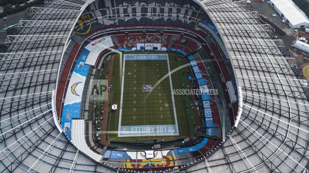 Christian Palma An aerial view of the Azteca Stadium in Mexico City, Saturday, Nov. 16, 2019, where the Kansas City Chiefs and Los Angeles Rams will face off for a regular-season Monday Night Football game. Heavy rain and heavy use last year left the grass unfit for the AFC matchup, forcing the Chiefs-Rams game to be relocated to Los Angeles. (AP Photo/Christian Palma)