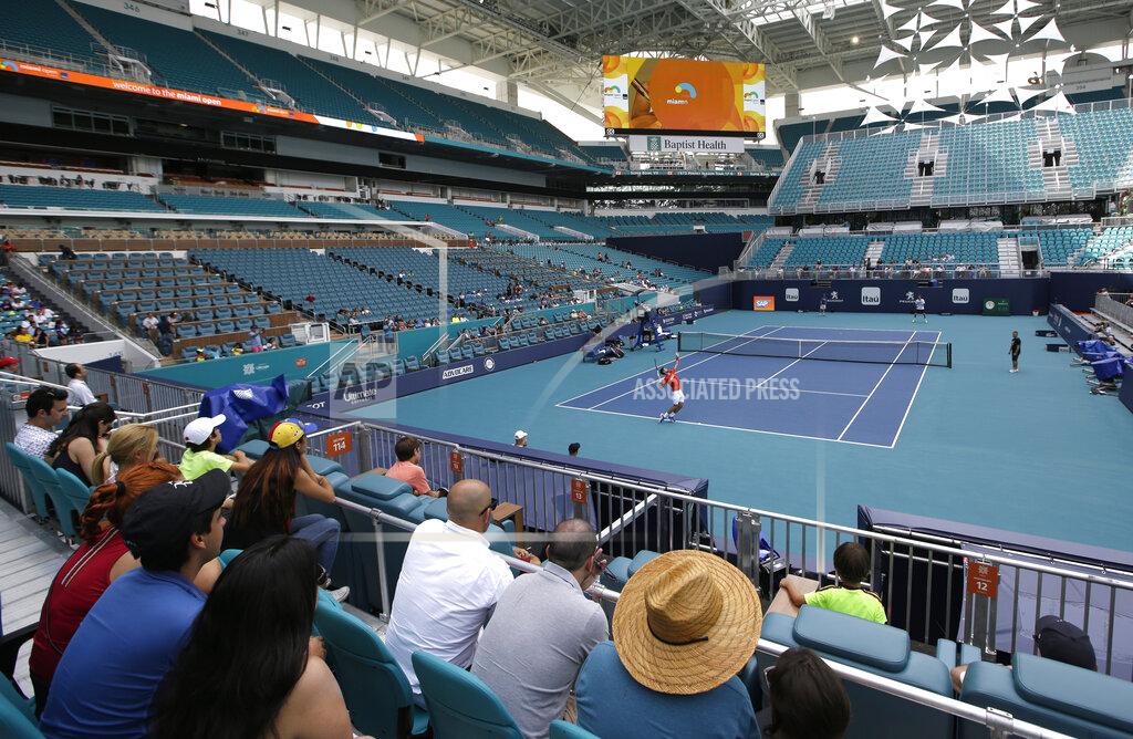 Lynne Sladky Novak Djokovic practices for the Miami Open tennis tournament at Hard Rock Stadium, Monday, March 18, 2019, in Miami Gardens, Fla. The Miami Open has moved north from its home since 1987, the picturesque island of Key Biscayne, and will begin Tuesday at the home of the Miami Dolphins and the Miami Hurricanes. (AP Photo/Lynne Sladky)