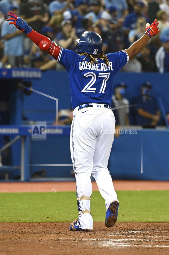 Jon Blacker Toronto Blue Jays' Vladimir Guerrero Jr. celebrates his solo home run against the Minnesota Twins during the third inning of a baseball game Friday, Sept. 17, 2021, in Toronto. (Jon Blacker/The Canadian Press via AP)