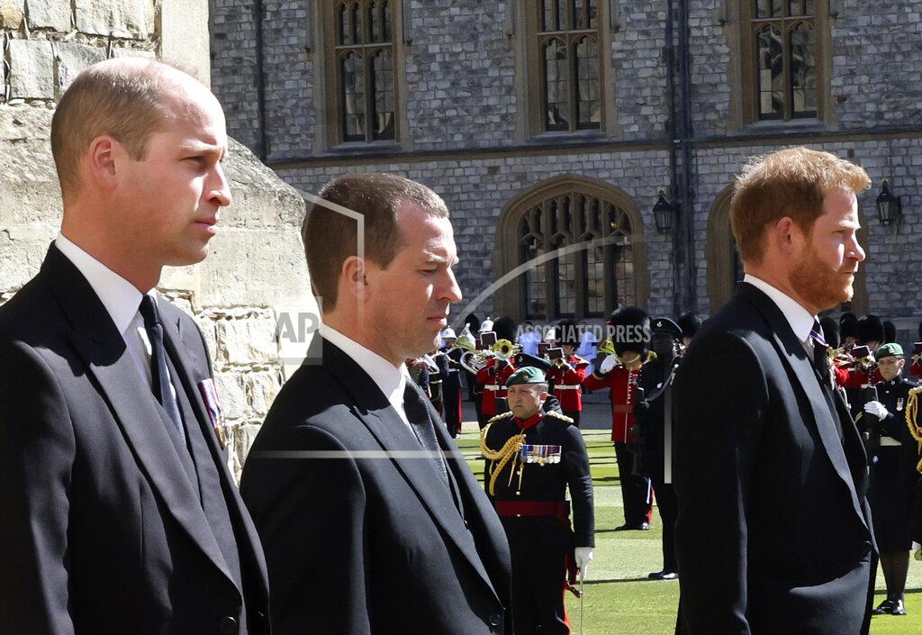 Chris Jackson From left, Prince William, Peter Phillips and Prince Harry walk in a procession behind the coffin of Prince Philip, during the funeral of Britain's Prince Philip inside Windsor Castle in Windsor, England, Saturday, April 17, 2021. Prince Philip died April 9 at the age of 99 after 73 years of marriage to Britain's Queen Elizabeth II. (Chris Jackson/Pool via AP)