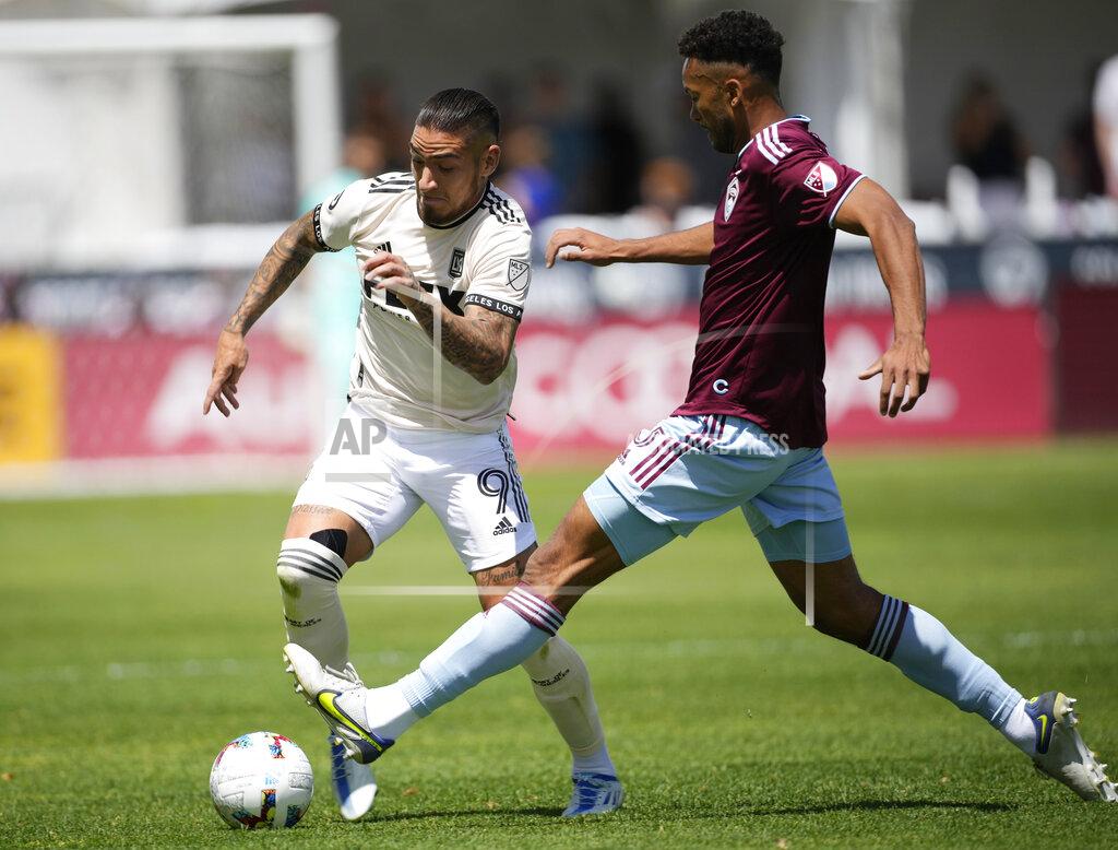David Zalubowski Los Angeles FC forward Cristian Arango, left, drives past Colorado Rapids defender Auston Trusty in the first half of an MLS soccer match Saturday, May 14, 2022, in Commerce City, Colo. (AP Photo/David Zalubowski)