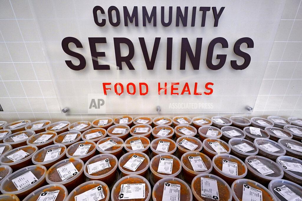 Charles Krupa Hundreds of containers of soup are prepared for clients at Community Servings, which prepares and delivers scratch-made, medically tailored meals to individuals & families living with critical & chronic illnesses, Tuesday, Jan. 12, 2021, in the Jamaica Plain neighborhood of Boston. Food is a growing focus for insurers as they look to improve the health of the people they cover and cut costs. Insurers first started covering Community Servings meals about five years ago, and CEO David Waters says they now cover close to 40%. (AP Photo/Charles Krupa)