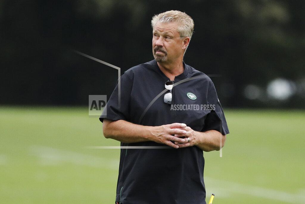 FILE - In this Aug. 21, 2019, file photo, New York Jets defensive coordinator Gregg Williams watches as players take part in drills at the team's NFL football training facility in Florham Park, N.J. Williams is fired up about the guys on his defense whose job is to make quarterbacks downright uncomfortable. (AP Photo/Frank Franklin II, File)
