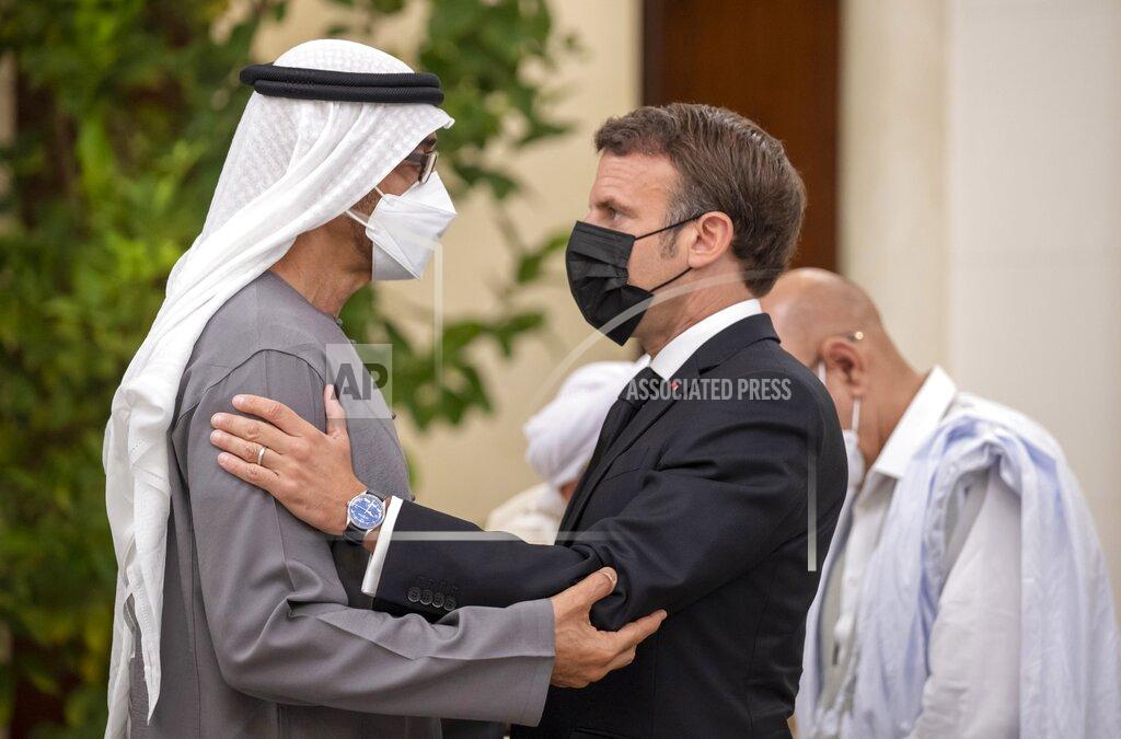 Abdulla Al Junaibi In this photo made available by Ministry of Presidential Affairs, Emmanuel Macron, president of France, right, offers condolences to Sheikh Mohamed bin Zayed Al Nahyan, president of the UAE and ruler of Abu Dhabi, on the passing of Sheikh Khalifa bin Zayed Al Nahyan, late president of the UAE at Mushrif Palace in Abu Dhabi, UAE, Sunday, May 15, 2022. (Abdulla Al Junaibi/Ministry of Presidential Affairs via AP)