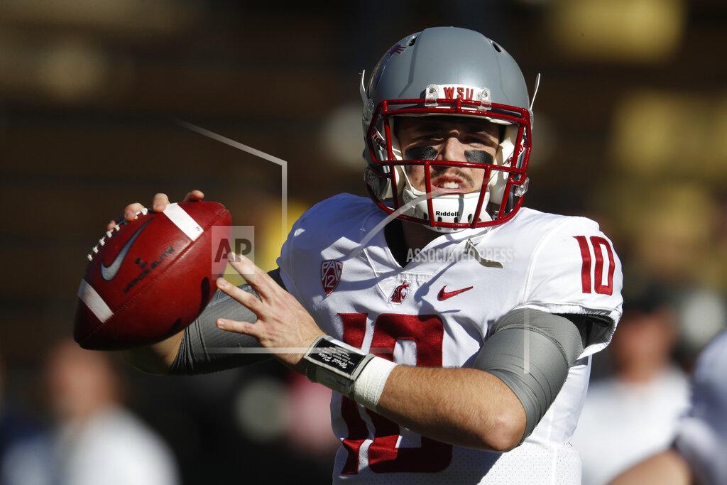 David Zalubowski FILE - In this Saturday, Nov. 10, 2018, file photo, Washington State quarterback Trey Tinsley warms up before the first half of an NCAA college football game in Boulder, Colo. Washington State has a spirited quarterback competition involving a large group of would-be starters, including seniors Anthony Gordon and Tinsley, Cammon Cooper, graduate transfer Gage Gubrud and sophomore John Bledsoe. (AP Photo/David Zalubowski, File)