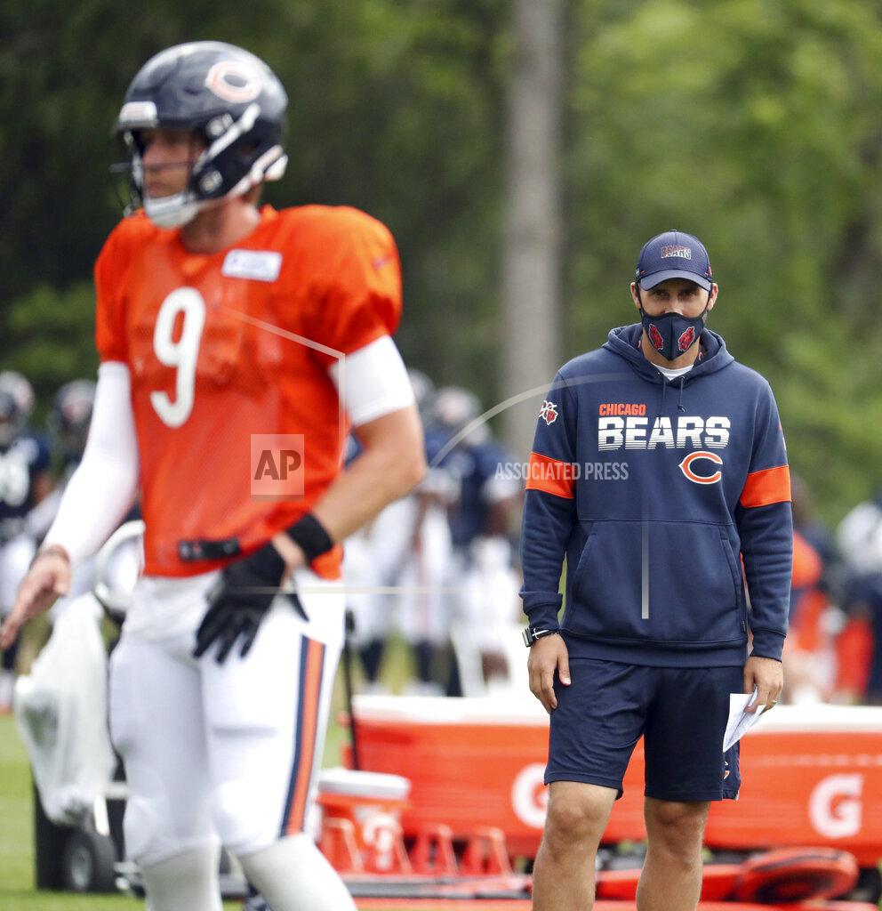 Brian Cassella FILE - In this Aug. 25, 2020, file photo, Chicago Bears quarterbacks coach Dave Ragone watches quarterback Nick Foles (9) during NFL football training camp at Halas Hall in Lake Forest, Ill. Arthur Smith, the new Atlanta Falcons coach, has started building his staff by hiring offensive coordinator Dave Ragone, defensive coordinator Dean Pees and special teams coach Marquice Williams. (Brian Cassella/Chicago Tribune via AP, Pool, File)