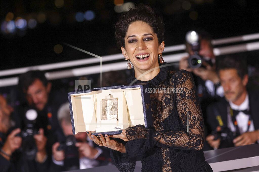 Vianney Le Caer Zahra Amir Ebrahimi, winner of the award for best actress for 'Holy Spider' poses for photographers during the photo call following the awards ceremony at the 75th international film festival, Cannes, southern France, Saturday, May 28, 2022. (Photo by Vianney Le Caer/Invision/AP)