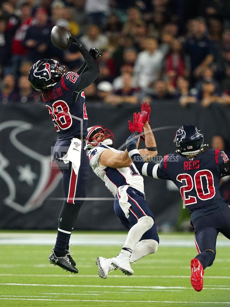 David J. Phillip Houston Texans cornerback Vernon III Hargreaves (28) breaks up a pass intended for New England Patriots wide receiver Julian Edelman (11) during the first half of an NFL football game Sunday, Dec. 1, 2019, in Houston. (AP Photo/David J. Phillip)
