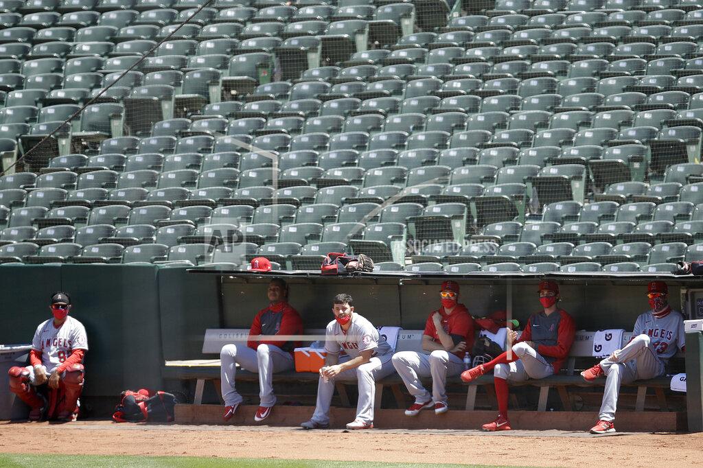 Ben Margot Los Angeles Angels sit in the bullpen during the fifth inning of the team's baseball game against the Oakland Athletics on Monday, July 27, 2020, in Oakland, Calif. (AP Photo/Ben Margot)