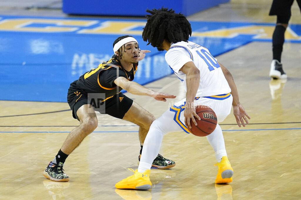 Ashley Landis Arizona State guard Jaelen House (10) defends against UCLA guard Tyger Campbell (10) during the first half of an NCAA college basketball game Saturday, Feb. 20, 2021, in Los Angeles. (AP Photo/Ashley Landis)
