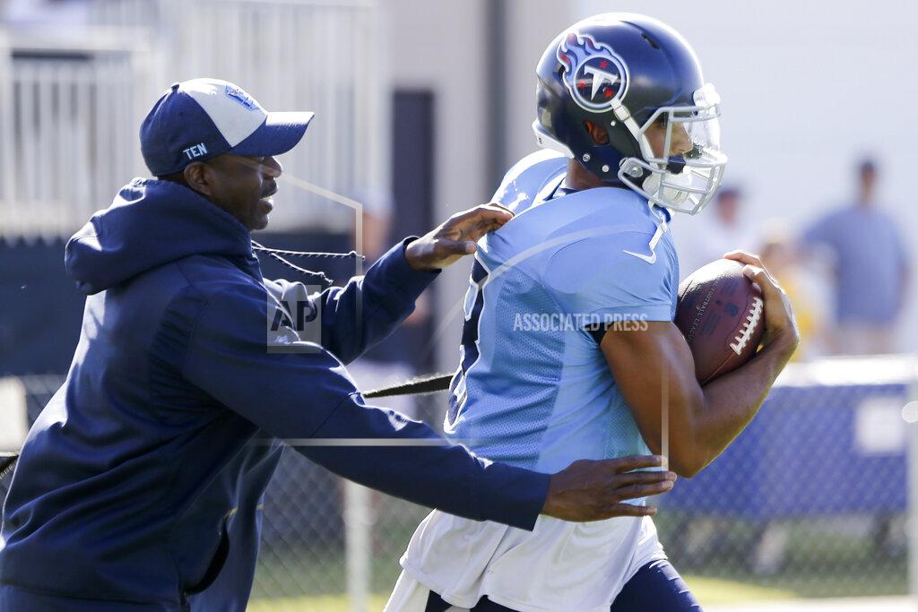 Mark Humphrey Tennessee Titans quarterback Marcus Mariota runs a drill during a combined NFL football training camp with the New England Patriots Thursday, Aug. 15, 2019, in Nashville, Tenn. (AP Photo/Mark Humphrey)