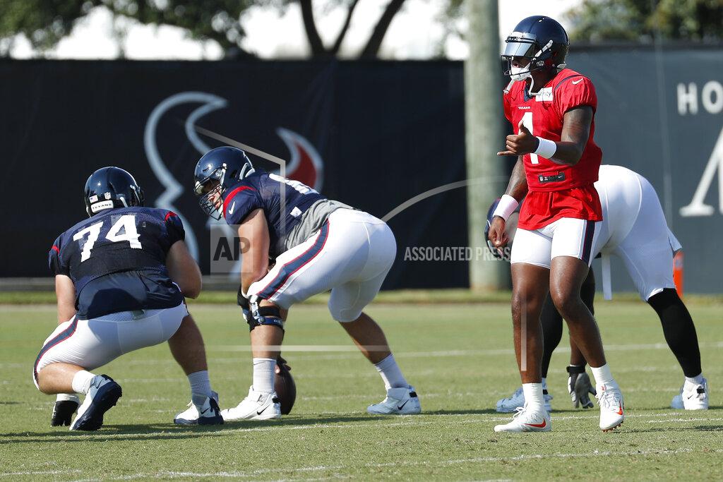 Houston Texans quarterback Deshaun Watson (4) calls out a play during an NFL training camp football practice Sunday, Aug. 23, 2020, in Houston. (Brett Coomer/Houston Chronicle via AP, Pool)