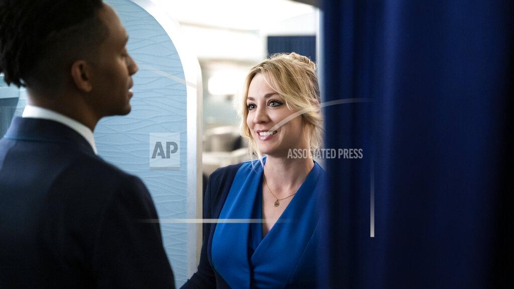 Phil Caruso This image released by HBO Max shows Griffin Matthews, left, and Kaley Cuoco in a scene from the series "The Flight Attendant." The Screen Actors Guild has nominated the cast for a SAG Award for best ensemble in a comedy series. (Phil Caruso/HBO Max via AP)