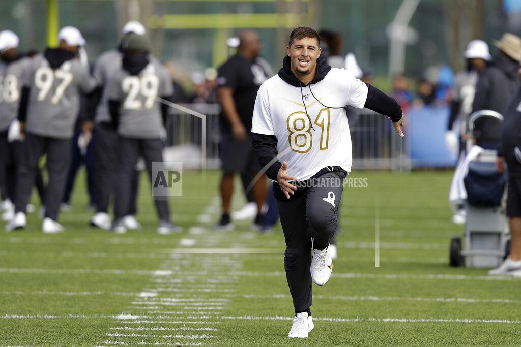 Chris O'meara NFC tight end Austin Hooper, of the Atlanta Falcons, laughs as he runs a route during a practice for the NFL Pro Bowl football game Wednesday, Jan. 22, 2020, in Kissimmee, Fla. (AP Photo/Chris O'Meara)