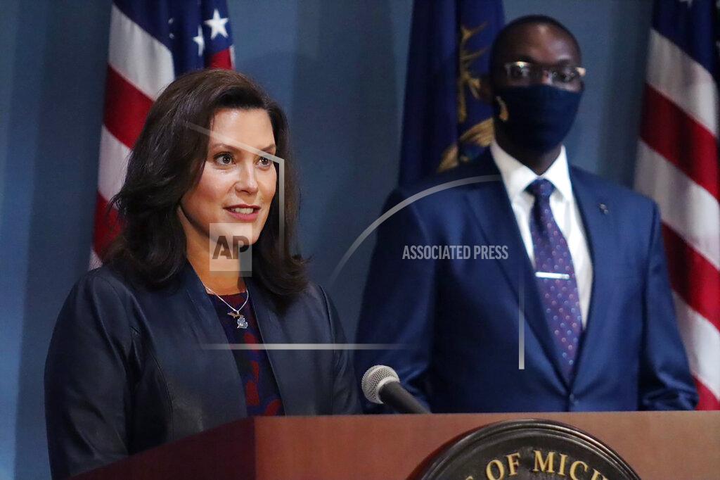 Uncredited FILE - In this Wednesday, Sept. 2, 2020 file photo provided by the Michigan Office of the Governor, Gov. Gretchen Whitmer addresses the state during a speech in Lansing, Mich. Gov. Whitmer's office said Thursday, Sept. 17, 2020, her requirement that athletes wear masks applies to Big Ten football in Michigan, but a face shield will suffice for players and the administration is open to potentially changing the order. (Michigan Office of the Governor via AP, File)