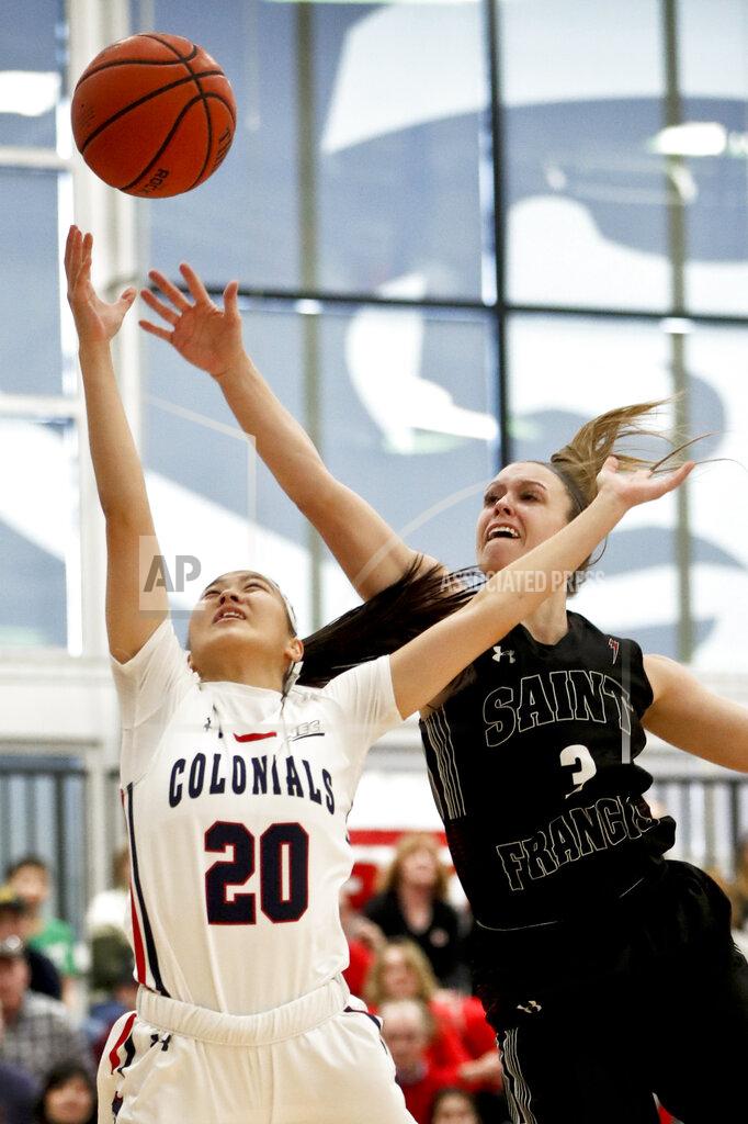 Keith Srakocic Robert Morris's Honoka Ikematsu (20) shoots as St. Francis (Pa)'s Karson Swogger defends during the first half of an NCAA college basketball game for the championship of the Northeast Conference women's tournament, Sunday, March 17, 2019, in Moon, Pa. (AP Photo/Keith Srakocic)