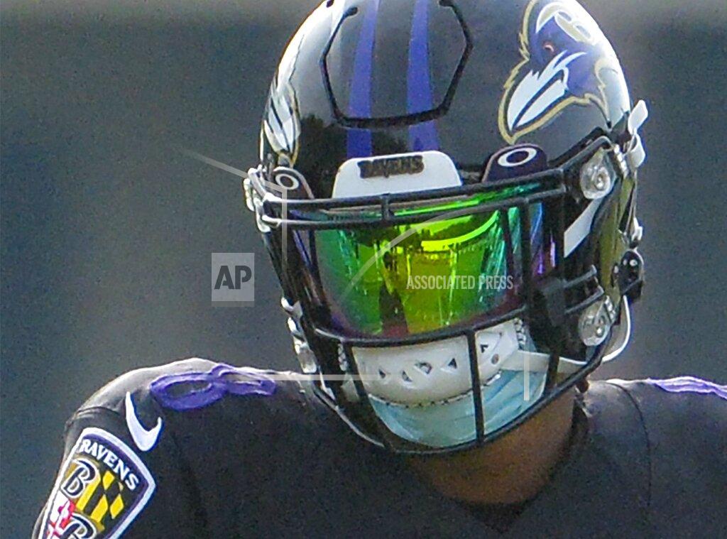 Kevin Richardson Baltimore Ravens quarterback Lamar Jackson at the start of football practice during training camp at Under Armour Performance Center on Sunday, Aug. 7, 2021 in Owings Mills, Md. (Kevin Richardson/The Baltimore Sun via AP)
