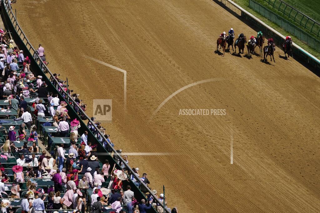 Charlie Riedel Horses run in race nine before the 147th running of the Kentucky Oaks at Churchill Downs, Friday, April 30, 2021, in Louisville, Ky. (AP Photo/Charlie Riedel)