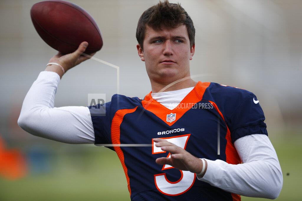 David Zalubowski Denver Broncos quarterback Drew Lock warms up during an NFL football training camp practice at the team's headquarters in Englewood, Colo., Tuesday, July 30, 2019. (AP Photo/David Zalubowski)