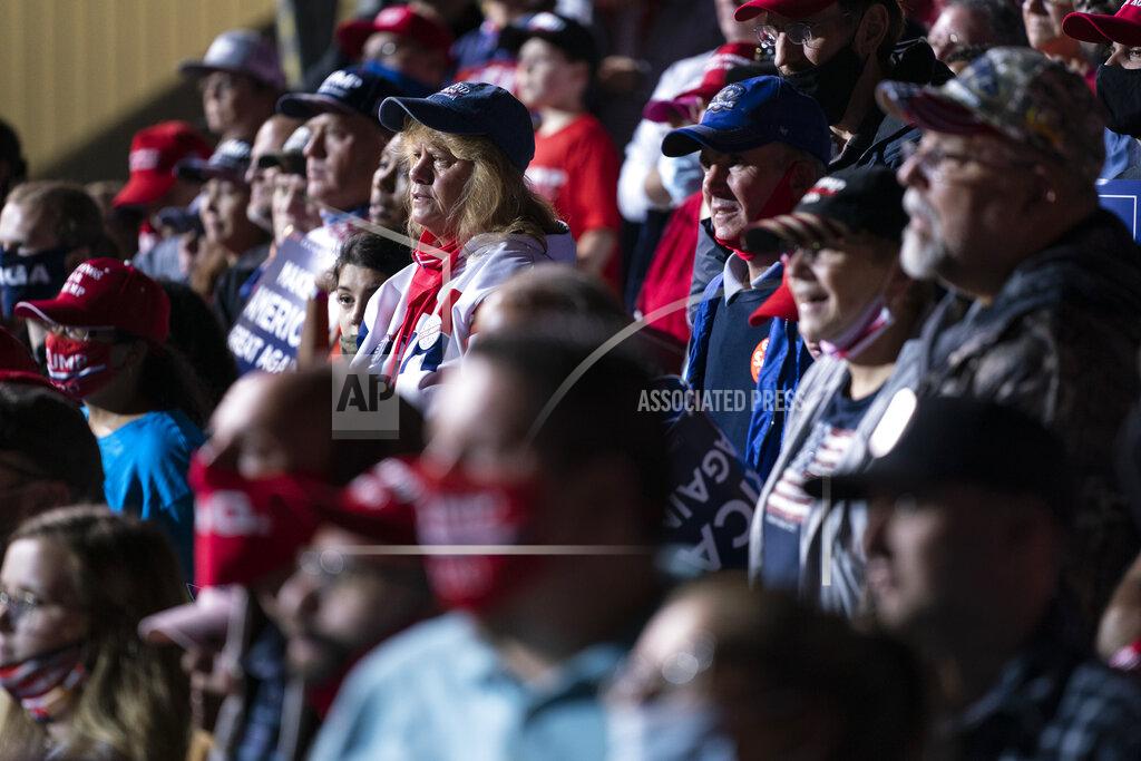 Evan Vucci Supporters of President Donald Trump listen as he speaks at a campaign rally, Friday, Sept. 25, 2020, in Newport News, Va. (AP Photo/Evan Vucci)