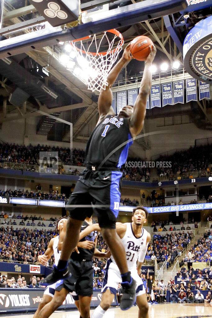 Keith Srakocic Duke's Zion Williamson (1) goes up for during a dunk in front of Pittsburgh's Terrell Brown (21) during the first half of an NCAA college basketball game, Tuesday, Jan. 22, 2019, in Pittsburgh. (AP Photo/Keith Srakocic)