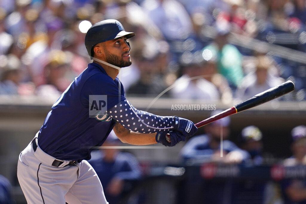 Gregory Bull Seattle Mariners' Abraham Toro watches his RBI-double during the first inning of a baseball game against the San Diego Padres, Monday, July 4, 2022, in San Diego. (AP Photo/Gregory Bull)