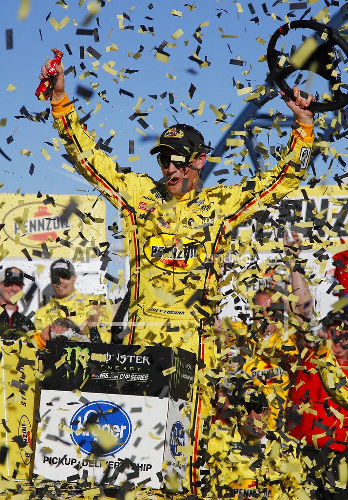 John Locher Joey Logano celebrates after winning a NASCAR Cup Series auto race at Las Vegas Motor Speedway, Sunday, March 3, 2019, in Las Vegas. (AP Photo/John Locher)