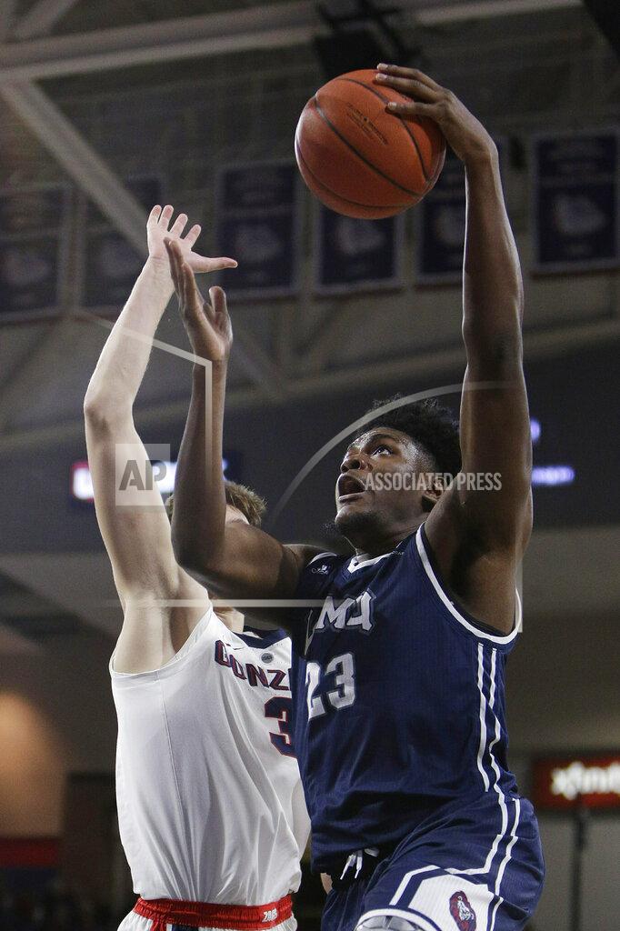 Young Kwak Loyola Marymount forward Jordan Bell, right, shoots while defended by Gonzaga forward Filip Petrusev during the second half of an NCAA college basketball game in Spokane, Wash., Thursday, Jan. 17, 2019. Gonzaga won 73-55. (AP Photo/Young Kwak)