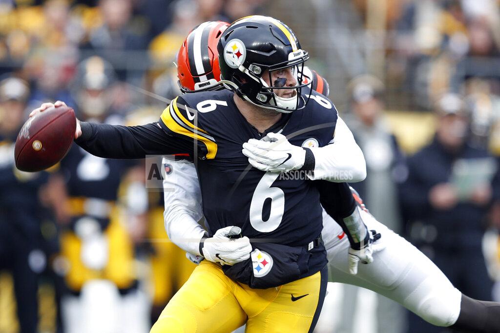 Don Wright Pittsburgh Steelers quarterback Devlin Hodges (6) is sacked buy Cleveland Browns defensive end Chad Thomas (92) in the first half of an NFL football game, Sunday, Dec. 1, 2019, in Pittsburgh. (AP Photo/Don Wright)