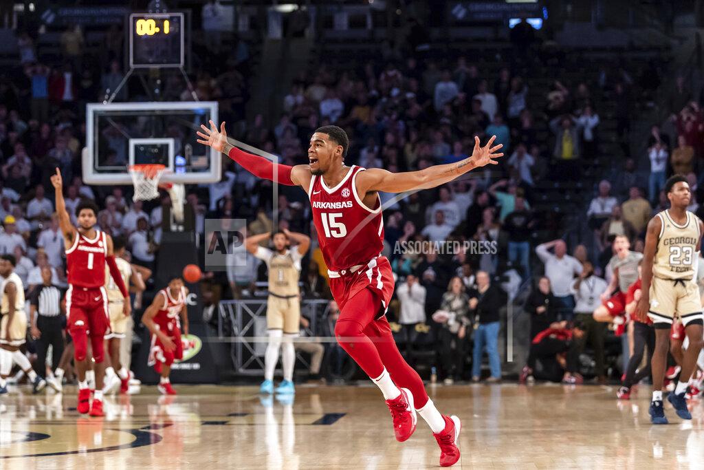 Danny Karnik Arkansas guard Mason Jones (15) reacts after hitting the game-winning 3-pointer in overtime of an NCAA college basketball game against Georgia Tech Monday, Nov. 25, 2019, in Atlanta. Arkansas won 62-61. (AP Photo/Danny Karnik)