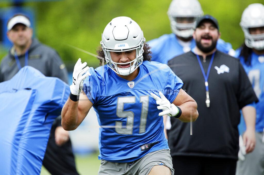 Duane Burleson Detroit Lions linebacker Jahlani Tavai (51) comes off a blocking sled as head coach Matt P{Patricia, right, looks on during NFL football training camp Wednesday, June 5, 2019, in Allen Park, Mich. (AP Photo/Duane Burleson)