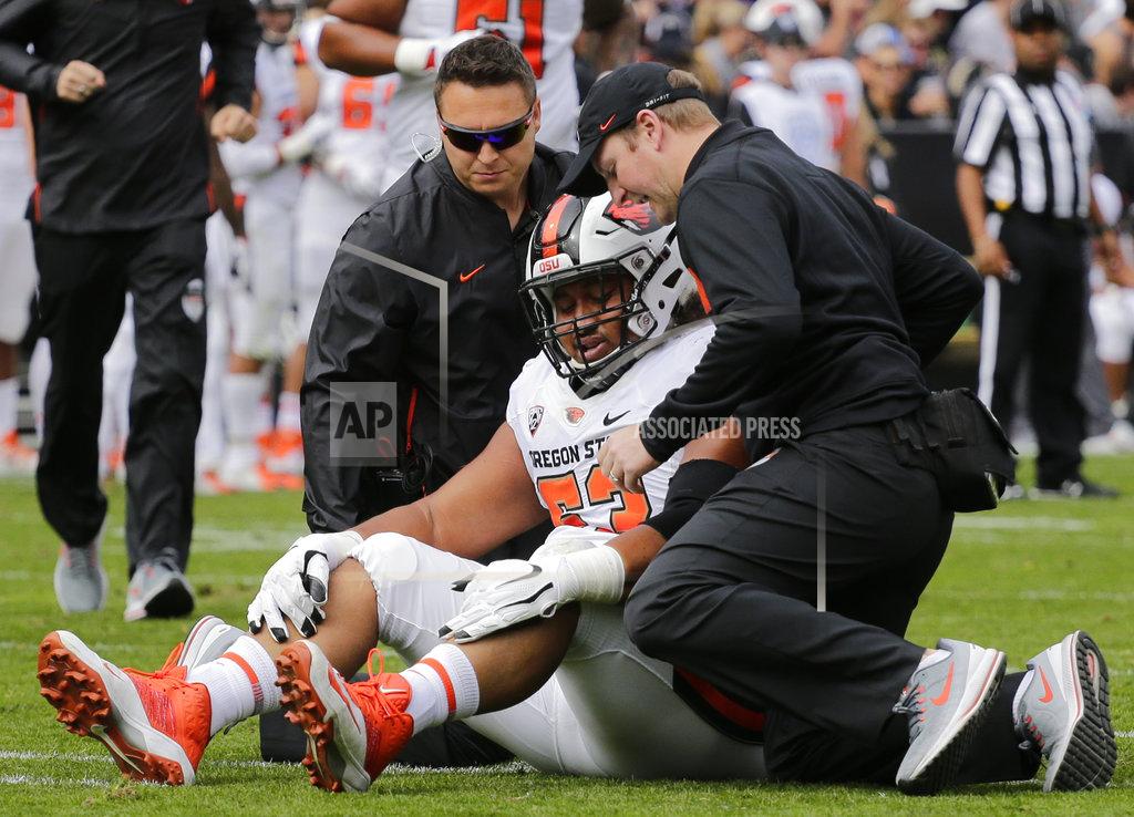 Jack Dempsey Oregon State offensive lineman Gus Lavaka is tended to by trainers after sustaining an injury during the first half of an NCAA college football game against Colorado, Saturday, Oct. 27, 2018, in Boulder, Colo. (AP Photo/Jack Dempsey)