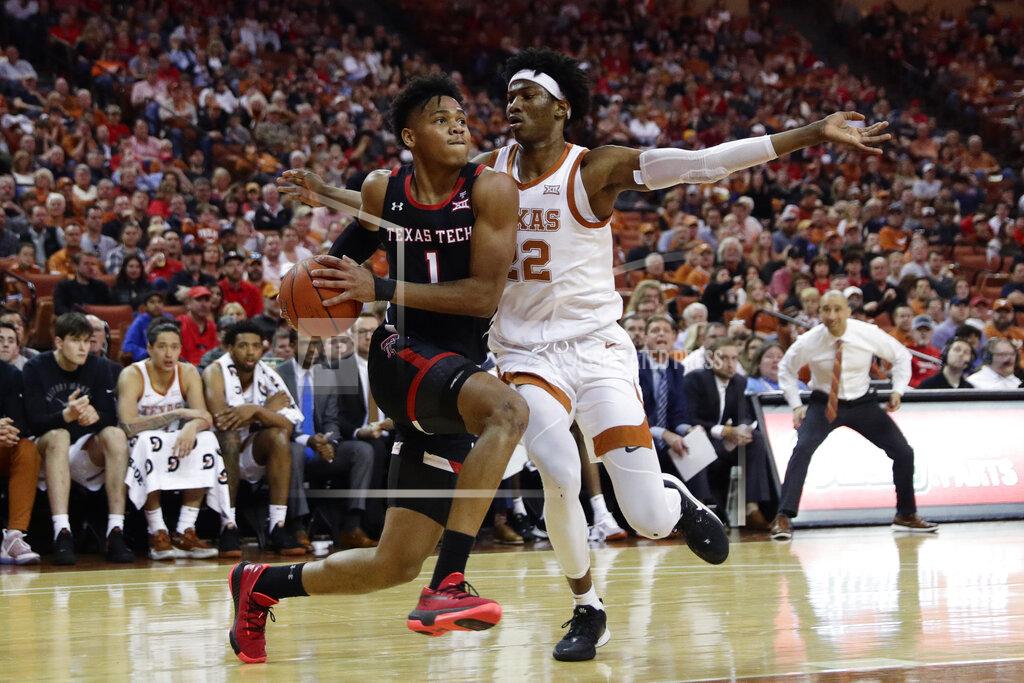 Eric Gay Texas Tech guard Terrence Shannon Jr. (1) drives to the basket past Texas forward Kai Jones (22) during the first half of an NCAA college basketball game, Saturday, Feb. 8, 2020, in Austin, Texas. (AP Photo/Eric Gay)