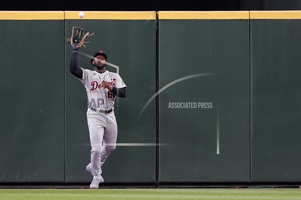 Ted S. Warren Detroit Tigers center fielder Akil Baddoo catches a deep fly hit by Seattle Mariners' Mitch Haniger during the fourth inning inning of a baseball game Tuesday, May 18, 2021, in Seattle. (AP Photo/Ted S. Warren)