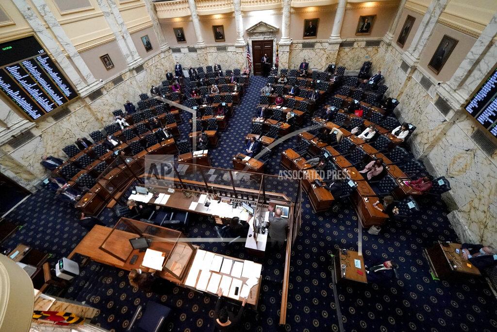 Julio Cortez Members of the Maryland House of Representatives are seen socially distanced to prevent the spread of COVID-19 during the first day of the state's 2021 legislative session, Wednesday, Jan. 13, 2021, in Annapolis, Md. (AP Photo/Julio Cortez)
