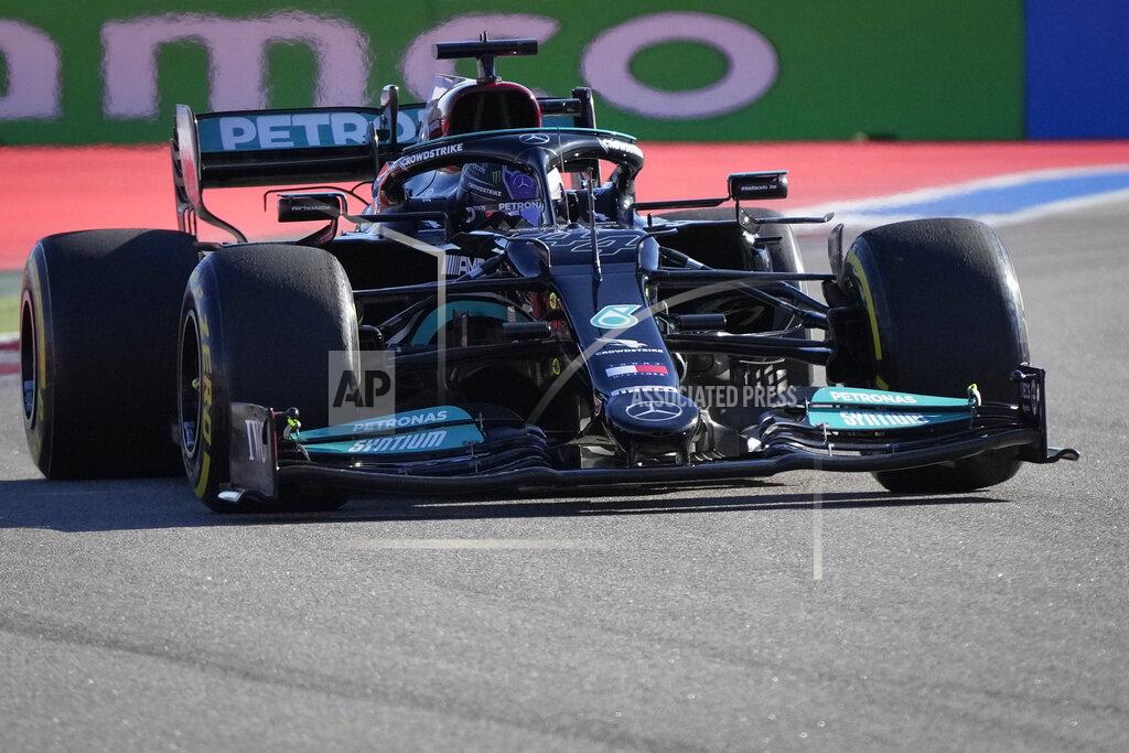 Sergei Grits Mercedes driver Lewis Hamilton of Britain steers his car during the second practice session at the Sochi Autodrom circuit, in Sochi, Russia, Friday, Sept. 24, 2021. The Russian Formula One Grand Prix will be held on Sunday. (AP Photo/Sergei Grits)