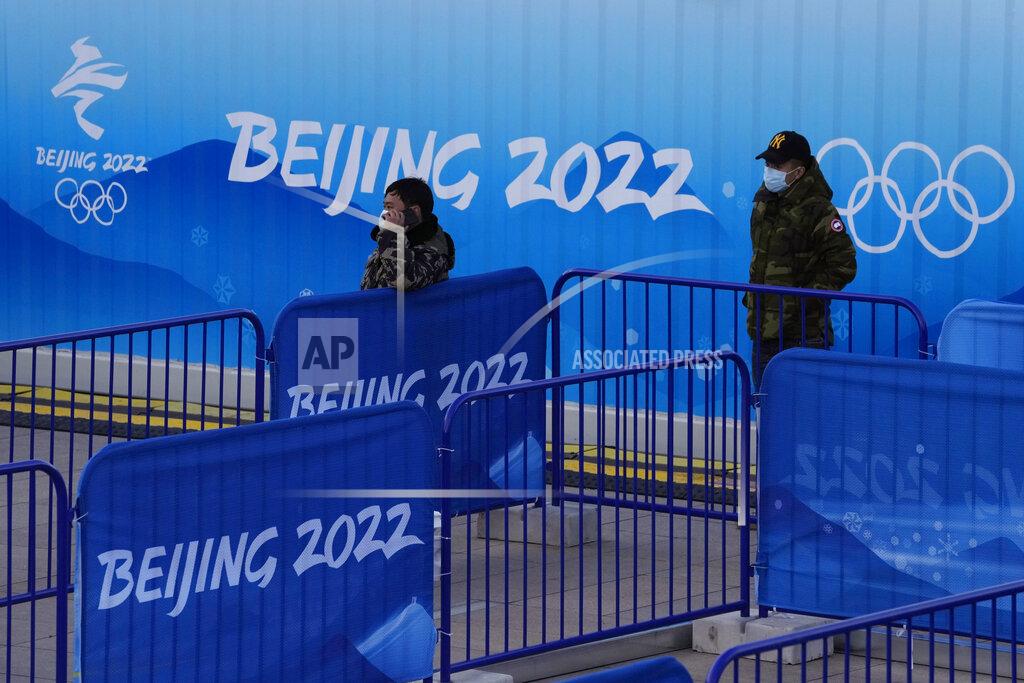 Ng Han Guan Workers stand near Beijing Winter Olympics log during a rehearsal of a victory ceremony at the Beijing Medals Plaza of the Winter Olympics in Beijing, China on Jan. 3, 2022. The Beijing Winter Olympics open in 30 days, and Norway is expected to head the medal table for the second straight time, even topping its record haul of 39 medals in 2018 in Pyeongchang, South Korea. This is the prediction of U.S.-based Gracenote Sports, which released its outlook on Wednesday, Jan. 5, 2022 with the Olympics opening on Feb. 4. (AP Photo/Ng Han Guan)