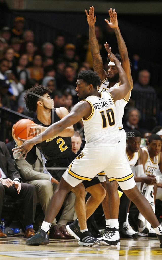 James H. Wallace Alabama State's Kevin Holston (2) is trapped by Virginia Commonwealth's Vince Williams (10) and Issac Vann during an NCAA college basketball game in Richmond, Va., Monday, Nov. 25, 2019. (James H. Wallace/Richmond Times-Dispatch via AP)