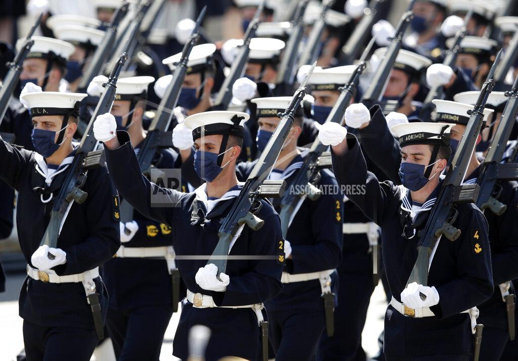 Thanassis Stavrakis Sailors march during a military parade in front of the Greek Parliament in Athens, Thursday, March 25, 2021. Greece celebrates the bicentenary of the start of the country's war of independence against the Ottoman Empire. (AP Photo/Thanassis Stavrakis)