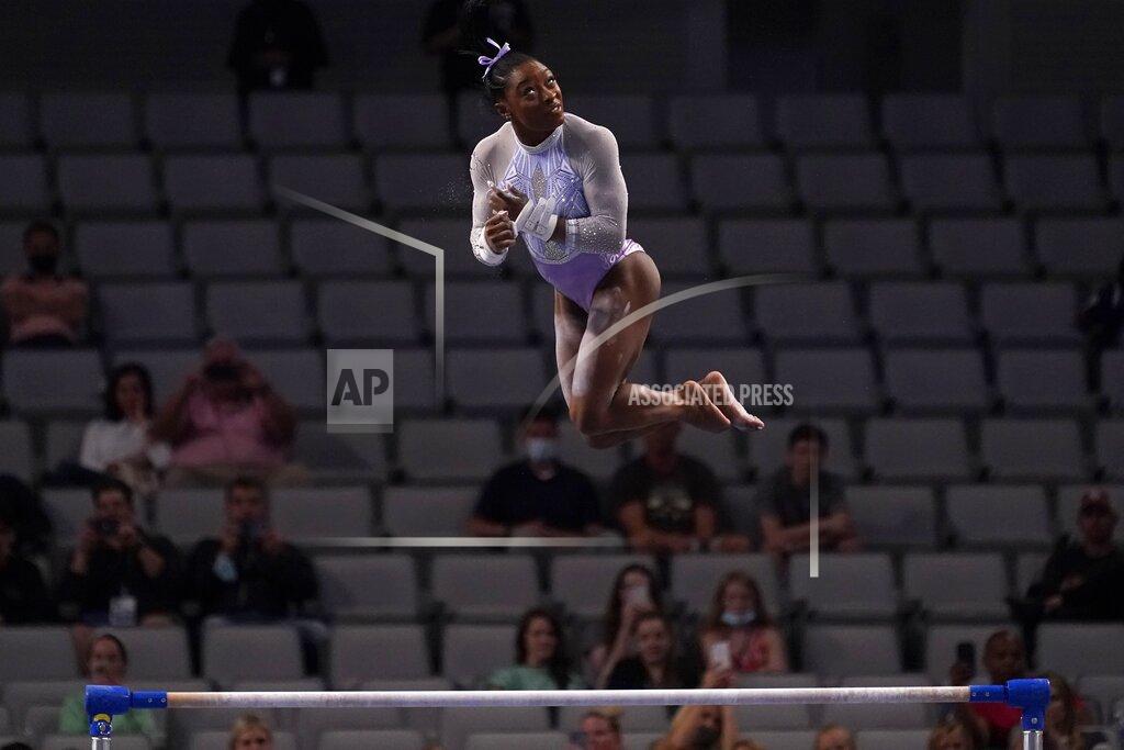 Tony Gutierrez Simone Biles competes on the uneven bars during the U.S. Gymnastics Championships, Friday, June 4, 2021, in Fort Worth, Texas. (AP Photo/Tony Gutierrez)