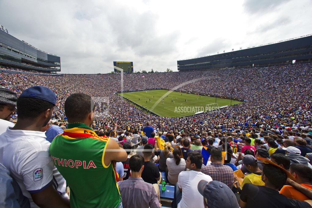 Tony Ding FILE - In this July 30, 2016, file photo, over 100,000 fans attend an International Champions Cup soccer match between Real Madrid and Chelsea at Michigan Stadium in Ann Arbor, Mich. The crippling grip the coronavirus pandemic has had on the sports world has forced universities, leagues and franchises to evaluate how they might someday welcome back fans. And while opinions vary from level to level, sport to sport and even nation to nation, one thing is universally clear: There won't be 100,000-plus fans packed into Michigan Stadium this fall, or 16,300 seated to the rafters of Allen Fieldhouse when hoops season rolls around. (AP Photo/Tony Ding, Fle)