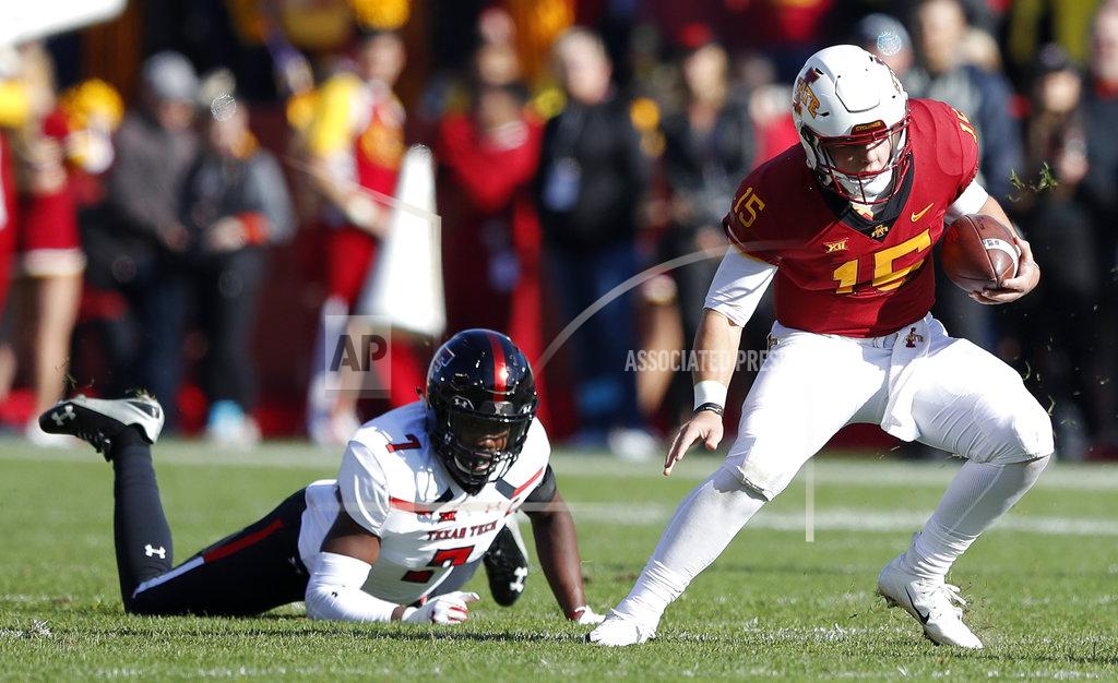Charlie Neibergall Iowa State quarterback Brock Purdy runs from Texas Tech defensive back Jah'Shawn Johnson, left, during the first half of an NCAA college football game, Saturday, Oct. 27, 2018, in Ames, Iowa. (AP Photo/Charlie Neibergall)