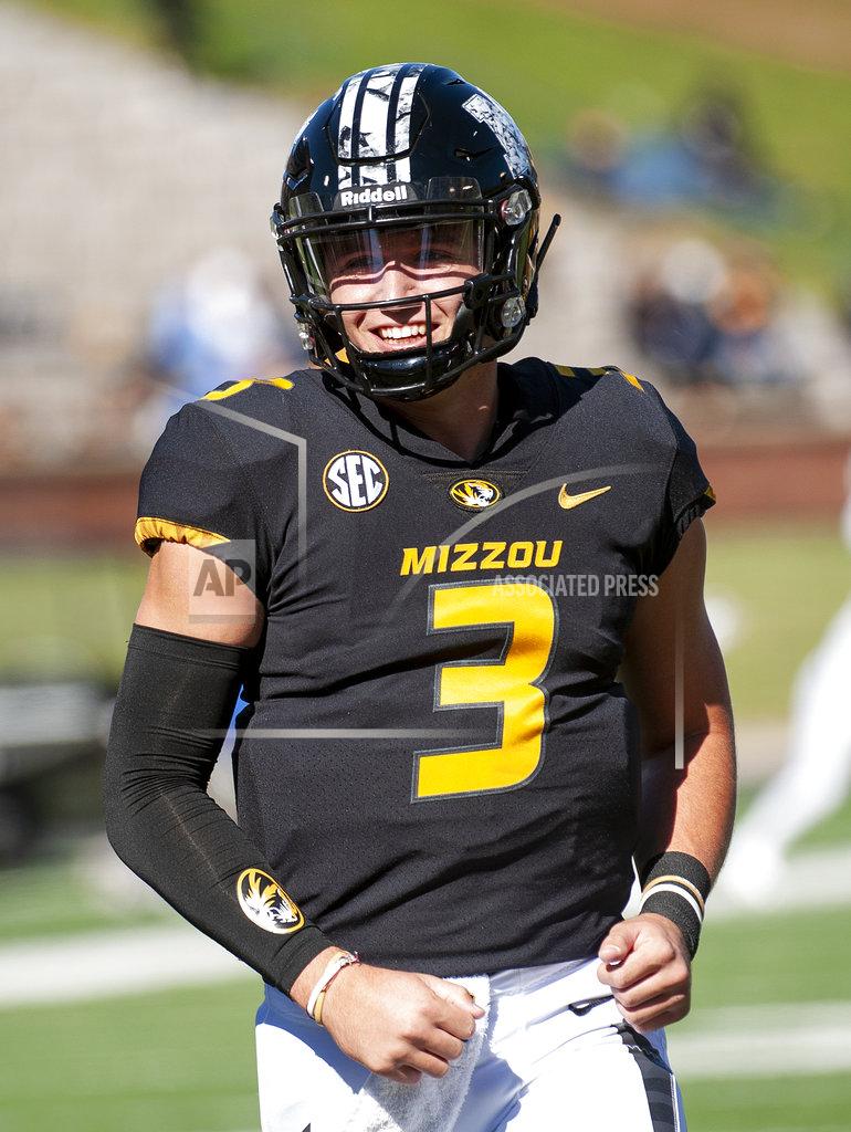 L.g. Patterson Missouri quarterback Drew Lock laughs with teammates before the start of an NCAA college football game against Memphis, Saturday, Oct. 20, 2018, in Columbia, Mo. Missouri won the game 65-33. (AP Photo/L.G. Patterson)