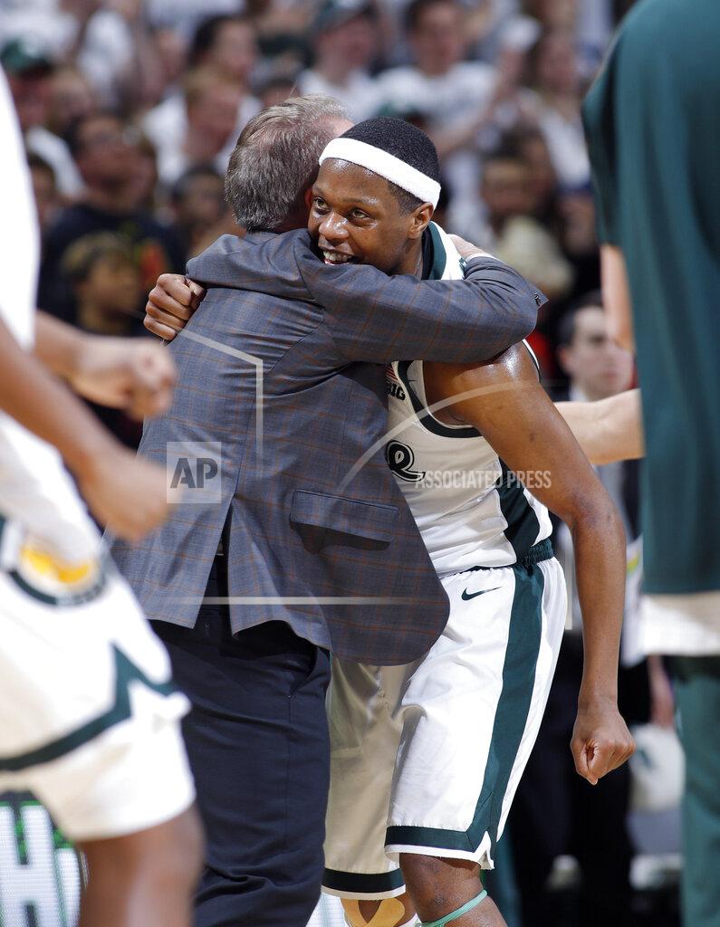 Al Goldis Michigan State coach Tom Izzo, left, hugs Cassius Winston during a timeout the second half of an NCAA college basketball game against Maryland, Monday, Jan. 21, 2019, in East Lansing, Mich. Michigan State won 69-55. (AP Photo/Al Goldis)